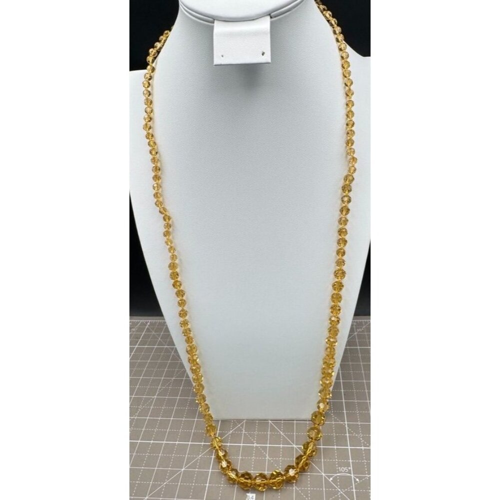 MMA Metropolitan Museum of Art 40" Carved Amber Rock Crystal Necklace with Tags